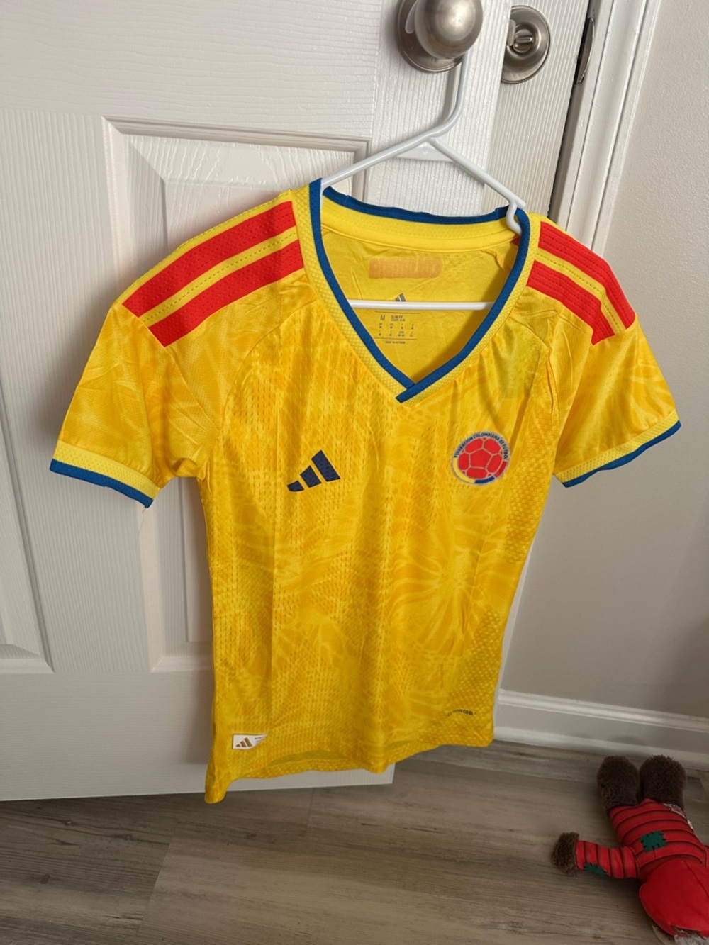 Women!! adidas Yellow Colombia Soccer Jersey with Red Stripes and Blue Trim $50